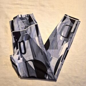 Fabletics Demi Lovato women's Medium  gray designed leggings EUC